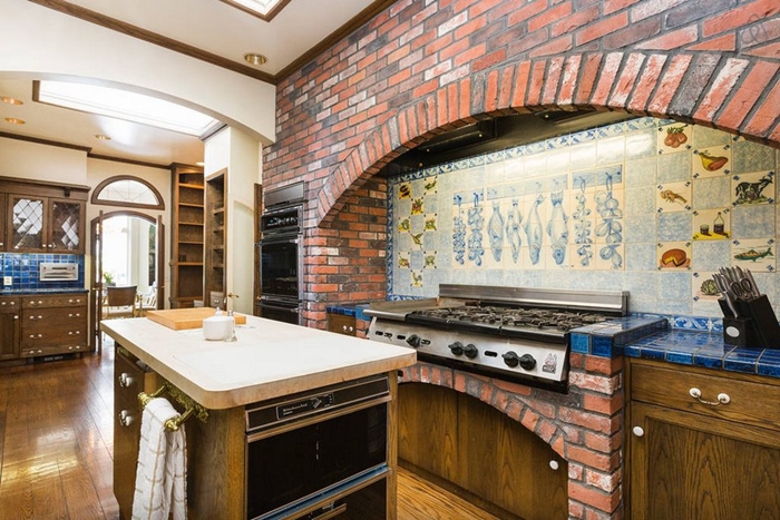 it-has-an-island-and-plenty-of-stove-space-for-cooking-multiple-dishes-at-once