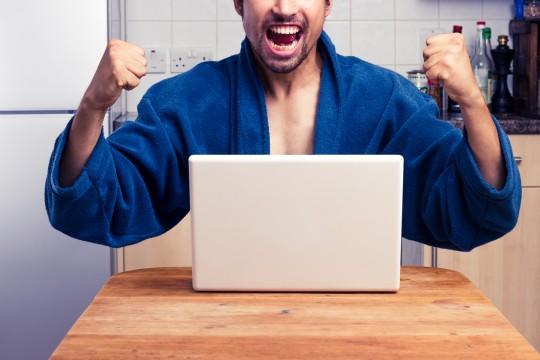 Man winning at home